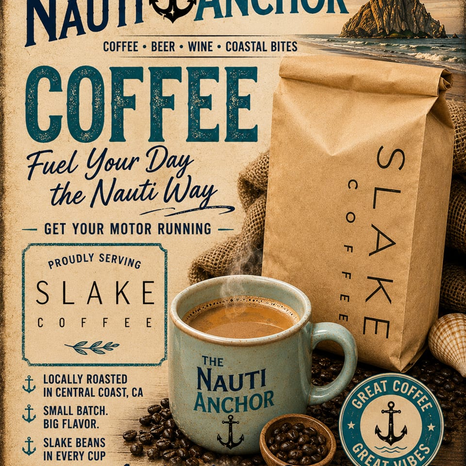 Steaming Nauti Anchor coffee mug, Slake coffee bag, and beans with a coastal Morro Bay background.